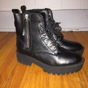 Black faux leather combat boots